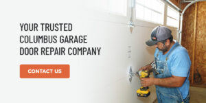 a man using a drill to drill a hole in a wall