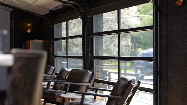 Private Bar - Glass Garage Doors - Deluxe Door Systems